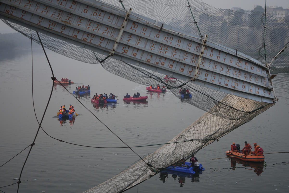 Suspension bridge collapse kills at least 132 in India