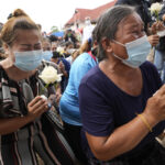 Thailand mourns children, others slain by ex-police officer