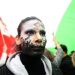 ‘Woman. Life. Freedom’: Thousands march in Paris to back Iran protests