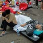 162 dead as Indonesia quake topples homes, buildings, roads