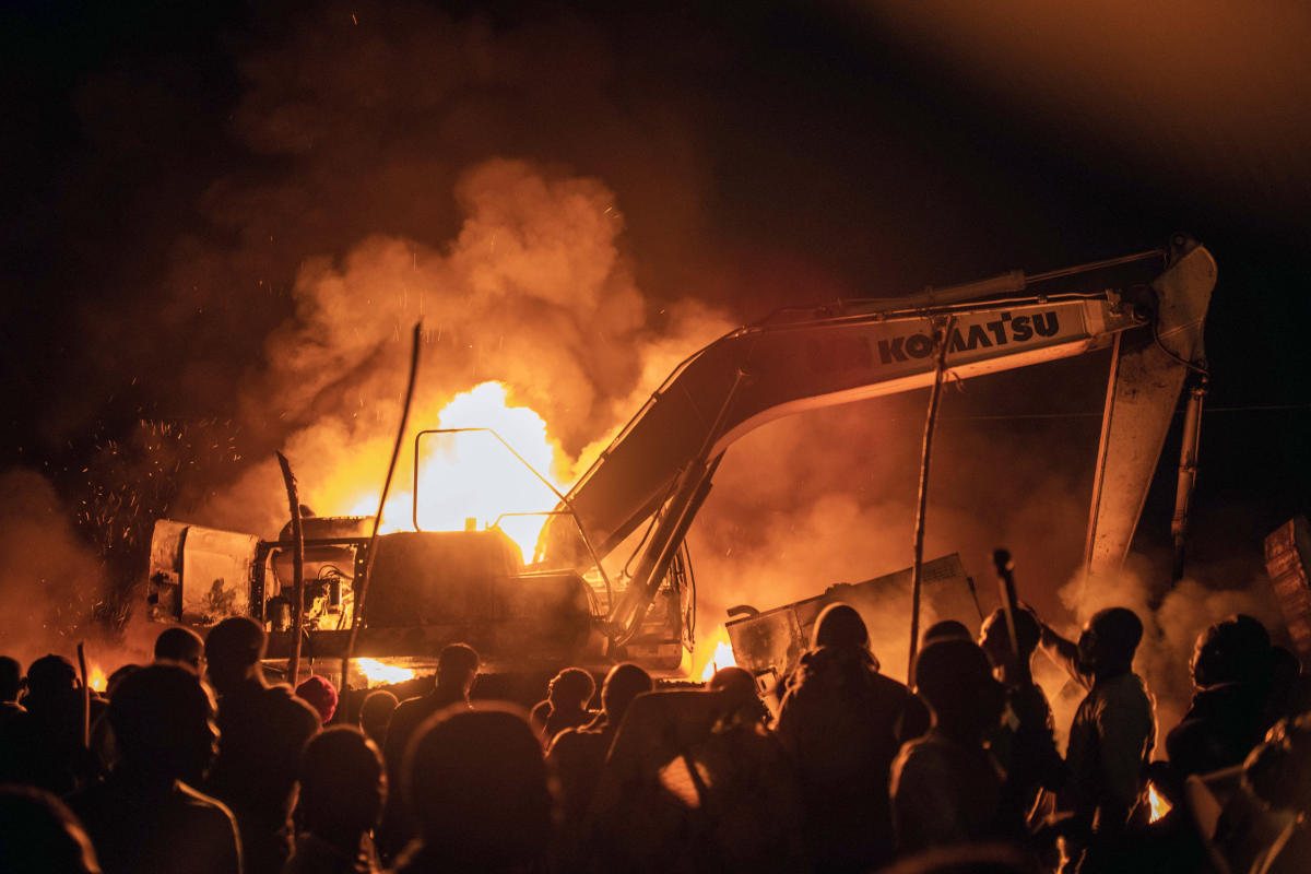 Angry crowds set fire to UN vehicles in eastern Congo