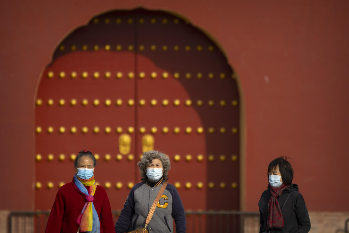 China tightens restrictions as rise in virus cases reported