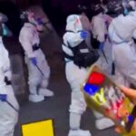 Cops in Hazmat Suits Beat Back Fiercest Chinese Protests Yet