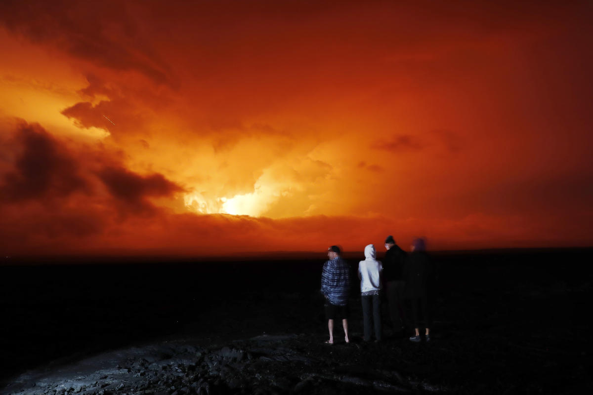 Hawaii volcano eruption has some on alert, draws onlookers