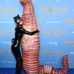 Heidi Klum crawls into her Halloween party as a fishing worm, gets hugs from daughter Leni