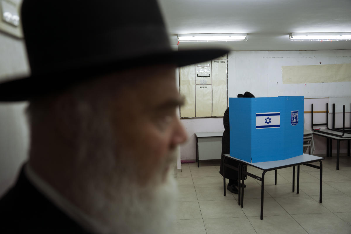 Israelis vote for 5th time in 4 years, with turnout surging