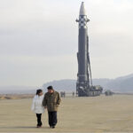 North Korea unveils Kim’s daughter at missile launch site