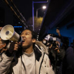 Protests against Covid lockdowns sweep China, challenging Xi