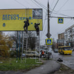 AP PHOTOS: Propaganda billboards embodied Russian occupation