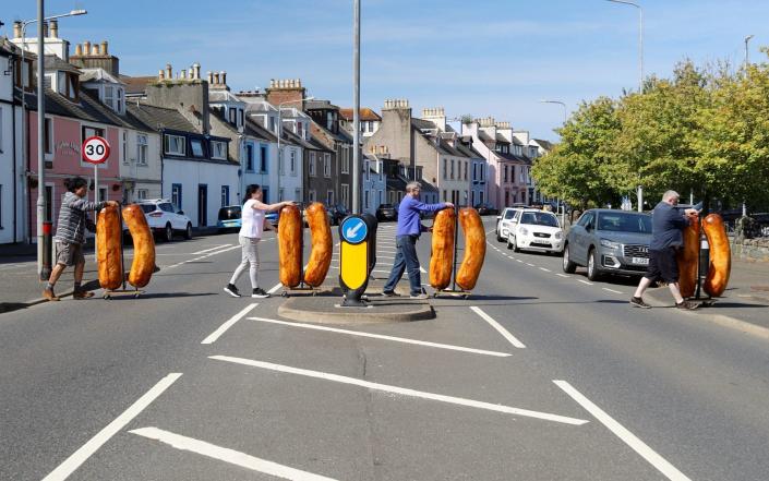 Brexit sausage wars inspires art exhibition featuring giant bangers crossing roads