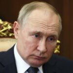 Cornered in Ukraine, Putin ditches annual news conference