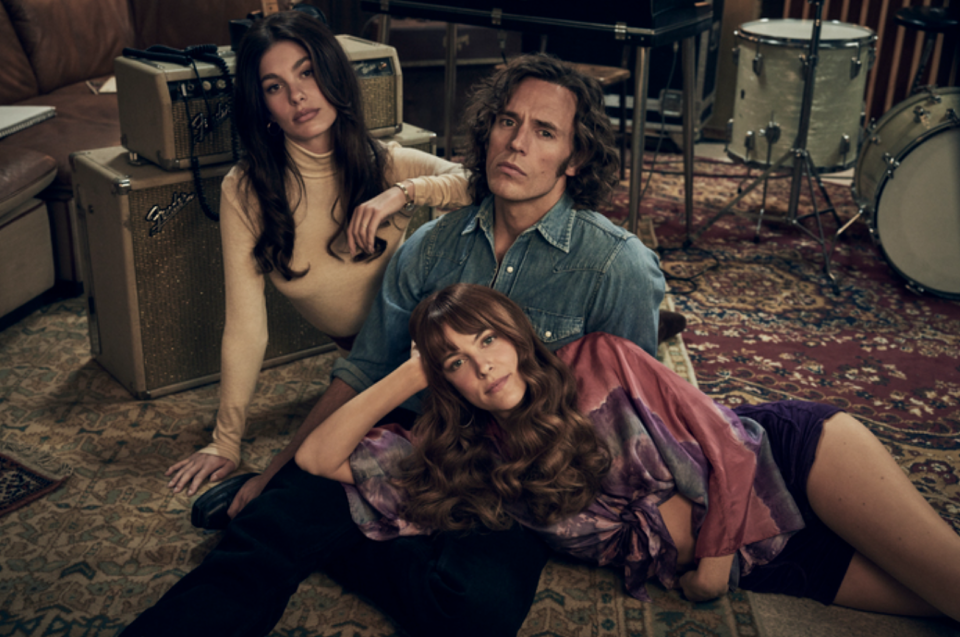 ‘Daisy Jones & The Six’ First Look: Riley Keough and Sam Claflin Fall in Love as 1970s Songwriters