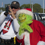 Deputy dressed as Grinch gives onions to speeding drivers