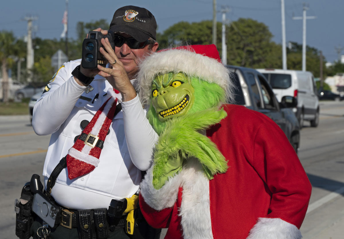 Deputy dressed as Grinch gives onions to speeding drivers