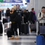 Holiday travel upended as forecasters warn of ‘bomb cyclone’