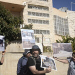 Israeli peace activists show presence in West Bank hot spot