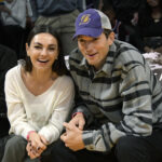 Mila Kunis was ‘curled up’ by Ashton Kutcher’s side during life-threatening illness: ‘She’s the best’