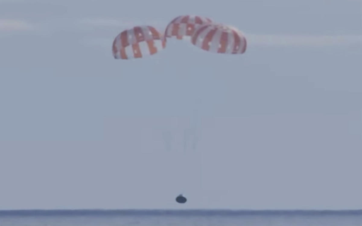 NASA’s Orion capsule blazes home from test flight to moon