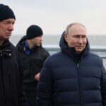 Putin Drives on Crimea Bridge Hit by Blast, Orders Full Repair