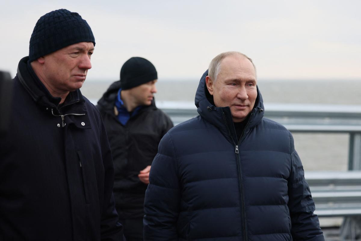 Putin Drives on Crimea Bridge Hit by Blast, Orders Full Repair